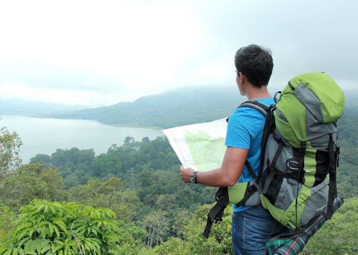 Colorful map of India highlighting popular budget backpacking routes with iconic location icons"