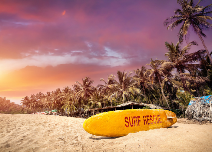 “Sunny Baga Beach in Goa during February – best state to visit in India for beaches and festivals”